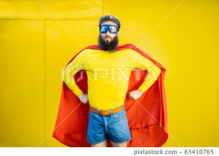 Superman portrait on the yellow background 63410765