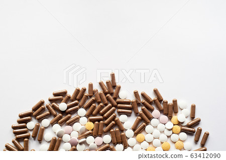 Vitamins and supplements, dietary supplements for the immune system.Dietary supplement.White background. 63412090