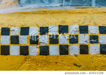 Old retro yellow taxi decorated with cobwebs Old retro yellow taxi decorated with cobwebs 63415198