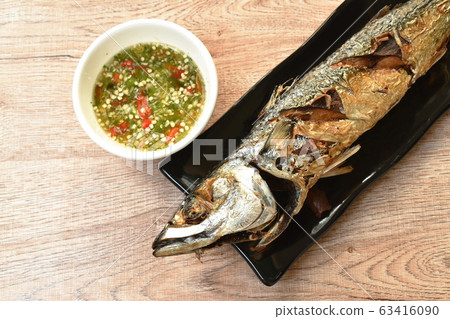 deep fried saba fish or mackerel on plate dipping spicy sauce deep fried saba fish or mackerel on plate dipping spicy sauce 63416090