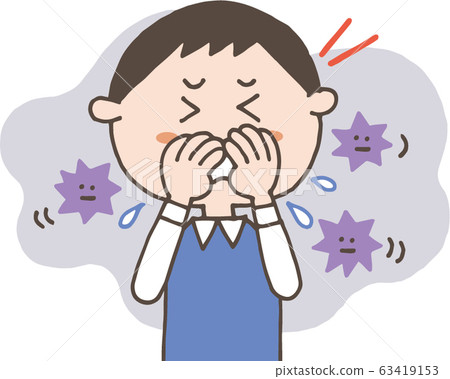A boy coughing and sneezing while covering his mouth with his hands 63419153