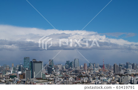 Tokyo cityscape in Japan: dark clouds overlooking the heart of Tokyo (the atmosphere becomes unstable and suddenly changes from the blue sky, dark clouds) = March 16 Tokyo cityscape in Japan: dark clouds overlooking the heart of Tokyo (the atmosphere becomes unstable and suddenly changes from the blue sky, dark clouds) = March 16 63419791