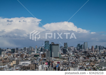 Tokyo cityscape in Japan: dark clouds overlooking the heart of Tokyo (the atmosphere becomes unstable and suddenly changes from the blue sky, dark clouds) = March 16 Tokyo cityscape in Japan: dark clouds overlooking the heart of Tokyo (the atmosphere becomes unstable and suddenly changes from the blue sky, dark clouds) = March 16 63420210