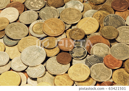 Coins of world taken closeup as a business background. 63421501