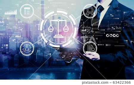 Legal advice service concept with businessman holding a tablet Legal advice service concept with businessman holding a tablet 63422366