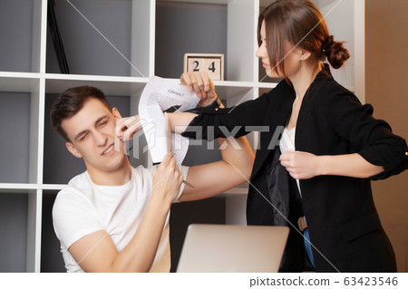 Angry woman has a conflict with the manager of the company 63423546