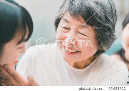 family grandchild and grandmother of high school student 63425812