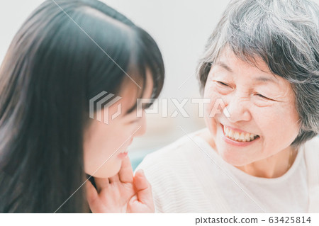 family grandchild and grandmother of high school student 63425814