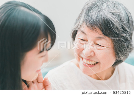 family grandchild and grandmother of high school student 63425815