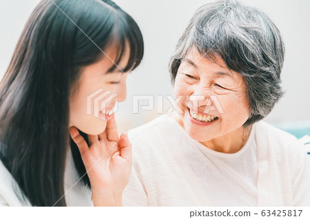 family grandchild and grandmother of high school student 63425817