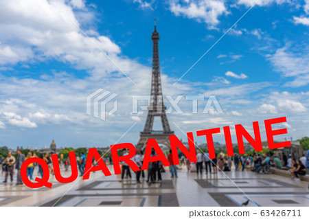 Coronavirus global pandemic quarantine sign with Eiffel Tower blurred background 63426711