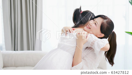 daughter give mom a hug daughter give mom a hug 63427812