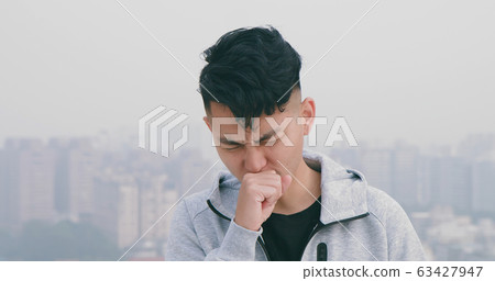 man cough and feel pain man cough and feel pain 63427947