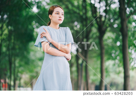 Beautiful woman, park, nature 63428203