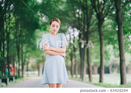 Beautiful woman, park, nature 63428204