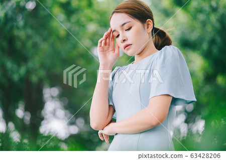 Beautiful woman, park, nature 63428206