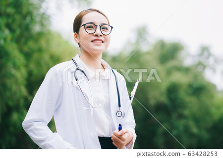 woman doctor, working, hospital woman doctor, working, hospital 63428253