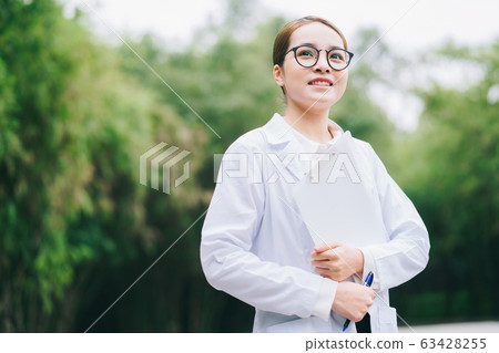 woman doctor, working, hospital woman doctor, working, hospital 63428255