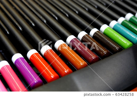 The colorful wooden pencil in the box.Close up The colorful wooden pencil in the box.Close up 63428258