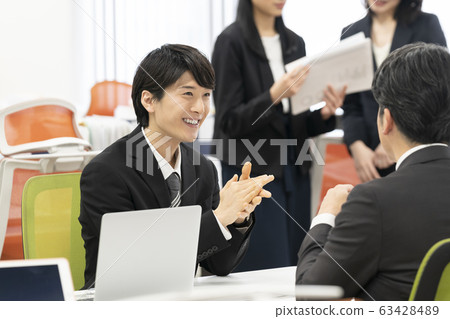 Business scene image young smiling businessman Business scene image young smiling businessman 63428489