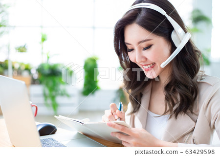 woman has video meeting 63429598