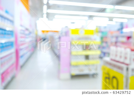 Bokeh blurred supermarket store with various goods 63429752