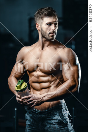 Bodybuilder athletic man workout muscles exercise. 63438370