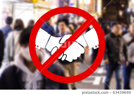 No handshake sign on abstract crowd background. Hygiene and Quarantine Concept. No handshake sign on abstract crowd background. Hygiene and Quarantine Concept. 63439699