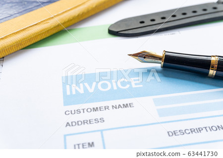 Invoice business document close up with pen background Invoice business document close up with pen background 63441730