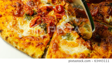 Cutting famous Neapolitan pizza based on buffalo Cutting famous Neapolitan pizza based on buffalo 63443111