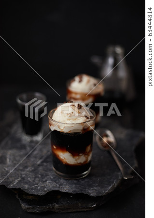 Iced coffee with vanilla ice cream. Iced coffee with vanilla ice cream. 63444814