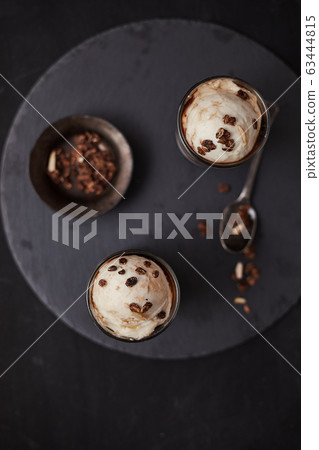 Iced coffee with vanilla ice cream. Iced coffee with vanilla ice cream. 63444815