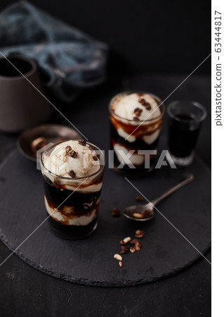 Iced coffee with vanilla ice cream. Iced coffee with vanilla ice cream. 63444817