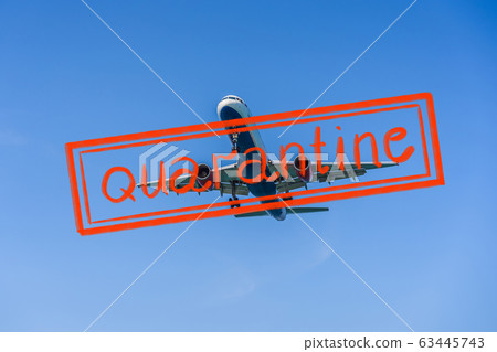 Quarantine due to coronavirus epidemic covid19 A white airplane flying in a clear pale blue sky Quarantine due to coronavirus epidemic covid19 A white airplane flying in a clear pale blue sky 63445743