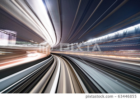 Motion blur of train moving inside tunnel with 63446855