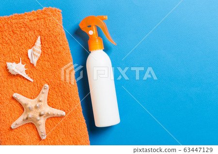 Summer beach flat lay accessories. Sunscreen Summer beach flat lay accessories. Sunscreen 63447129