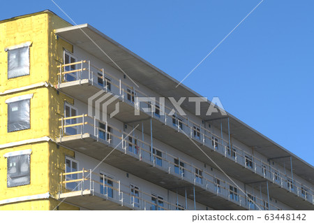 construction site residential building facade construction site residential building facade 63448142