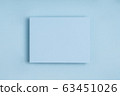 Minimal frame geometric composition mock up. Blank sheet of paper postcard on delicate blue. 63451026