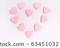 Pink hearts on white surface. Valentine composition. Greeting card. 63451032
