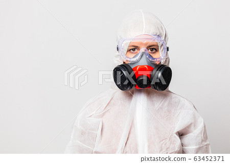 female doctor in protection suit and glasses with female doctor in protection suit and glasses with 63452371