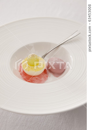 Ice cream dessert on white plate 63453008