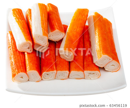 Many crab sticks on white surface Many crab sticks on white surface 63456119