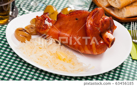 Plate of tasty baked pork knuckle Plate of tasty baked pork knuckle 63456185