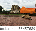 Reclining Buddha and dog in Ayutthaya Reclining Buddha and dog in Ayutthaya 63457680