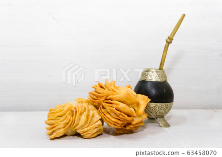 fried cakes and yerba mate typical of Argentine fried cakes and yerba mate typical of Argentine 63458070