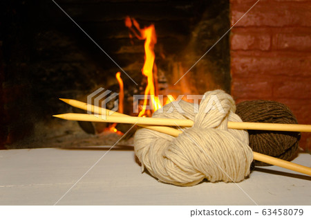 winter concept knitting wool and tricot needles 63458079