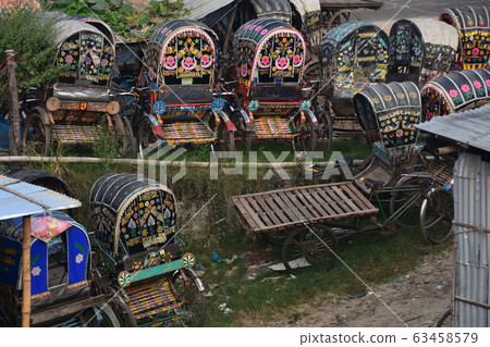 Chittagong, Bangladesh Bicycle taxi cycle rickshaw A lot of rickshaws and brightly patterned bodywork 63458579