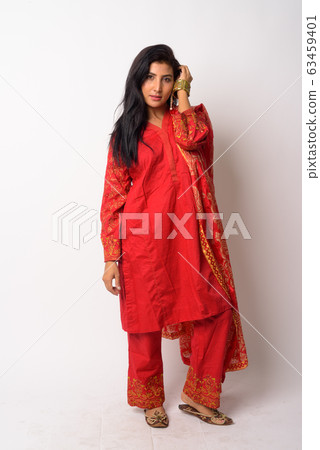 Full body shot of young Persian woman in traditional clothing 63459401