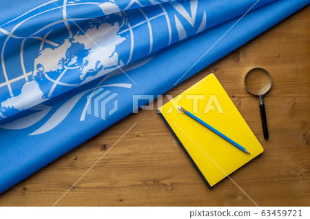 Close-up of the UN blue flag Close-up of the UN blue flag 63459721