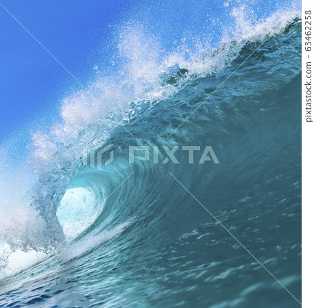 Ocean wave under the blue sky 63462258